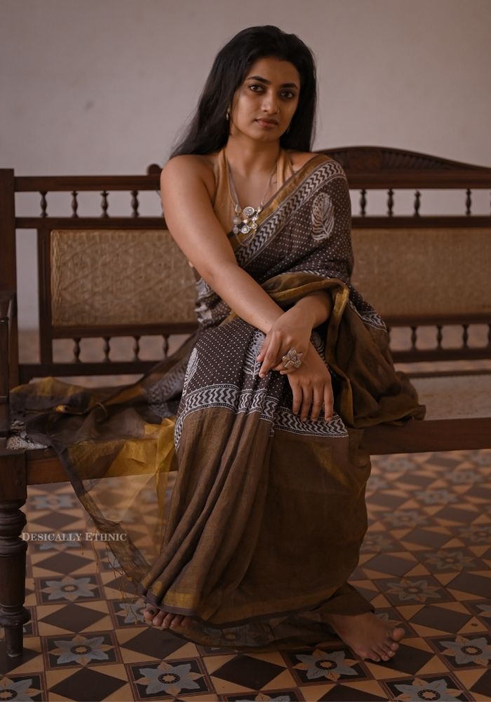 Saranya looks ravishing as she poses in a saree during a photoshoot.
