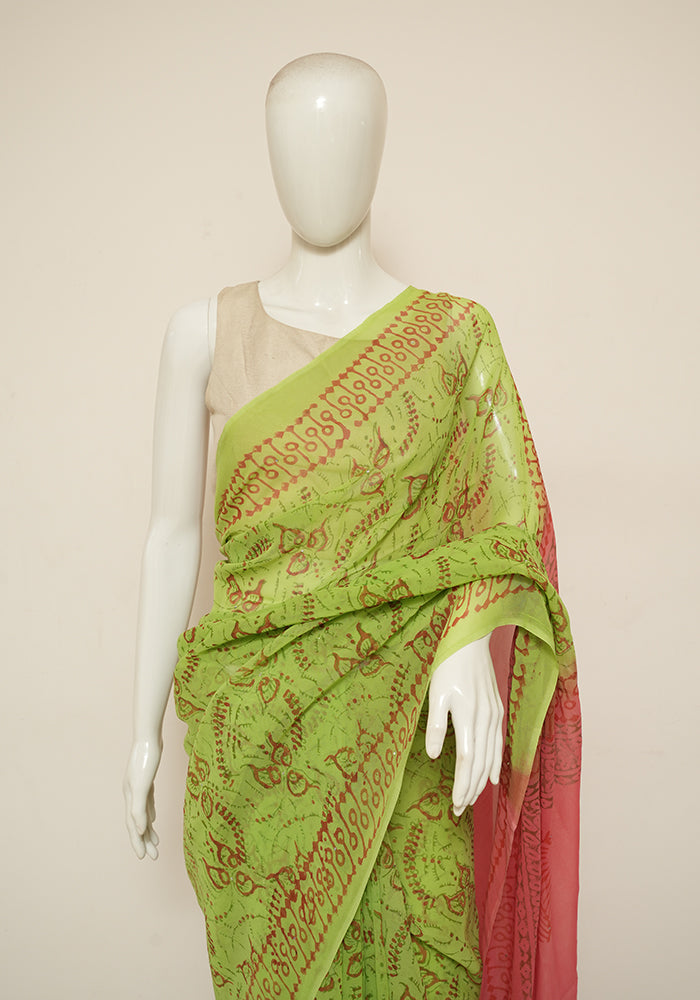 Parrot green and green color bandhej silk saree with zari weaving work