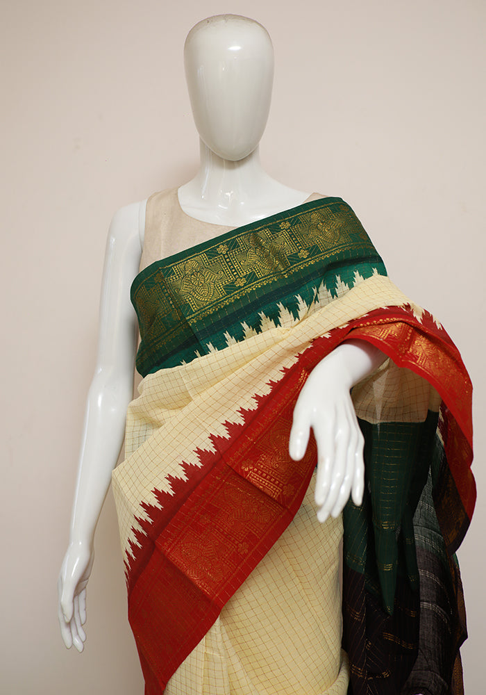 Off white saree with green outlet border